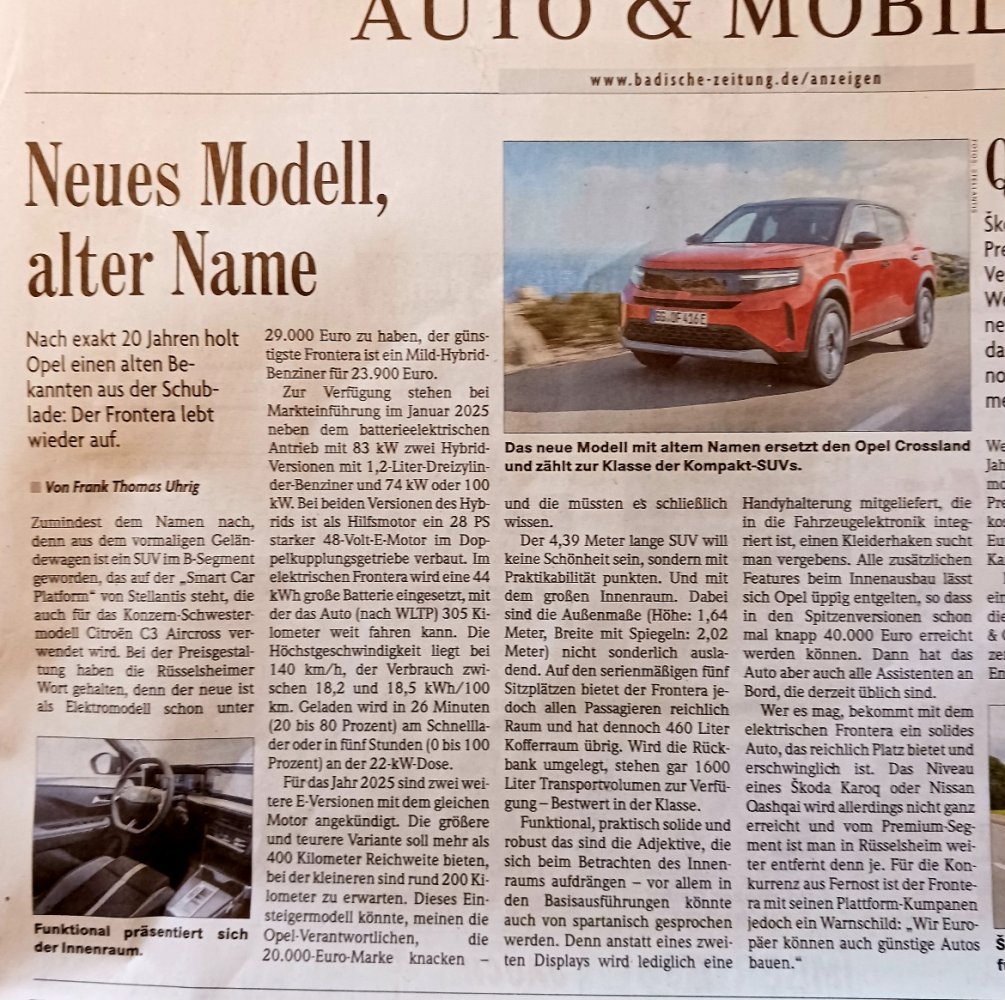 Opel mit rostigem Namensspender.jpg